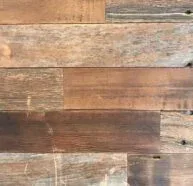 Close-up view of a wooden wall with horizontal planks in various shades of brown, featuring visible grain patterns and small knots. The wood has a rustic, reclaimed look, with some signs of wear and weathering.