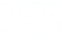 Logo of Reclaimed Enterprises, featuring large stylized letters R-E above the words Reclaimed Enterprises in capital letters. The design is in white on a transparent background.